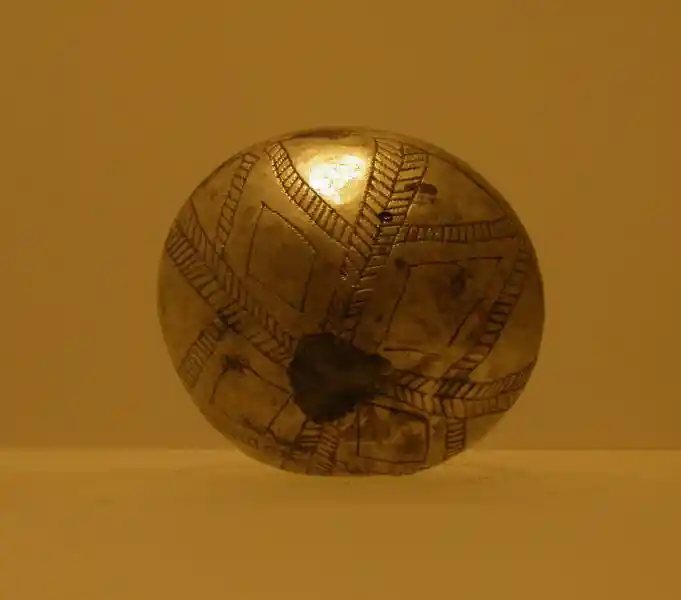 Metallic ball, solar cross, cross design